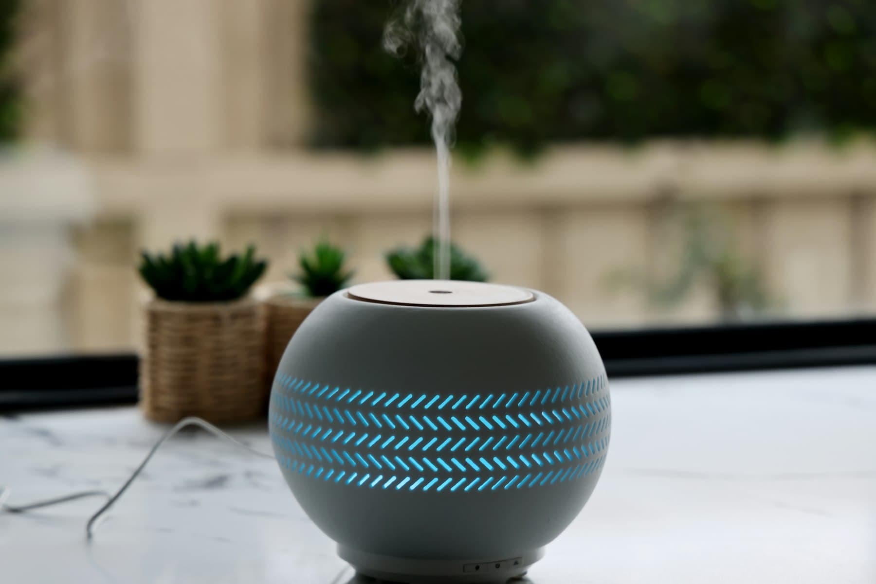 A bluetooth speaker sitting on top of a table